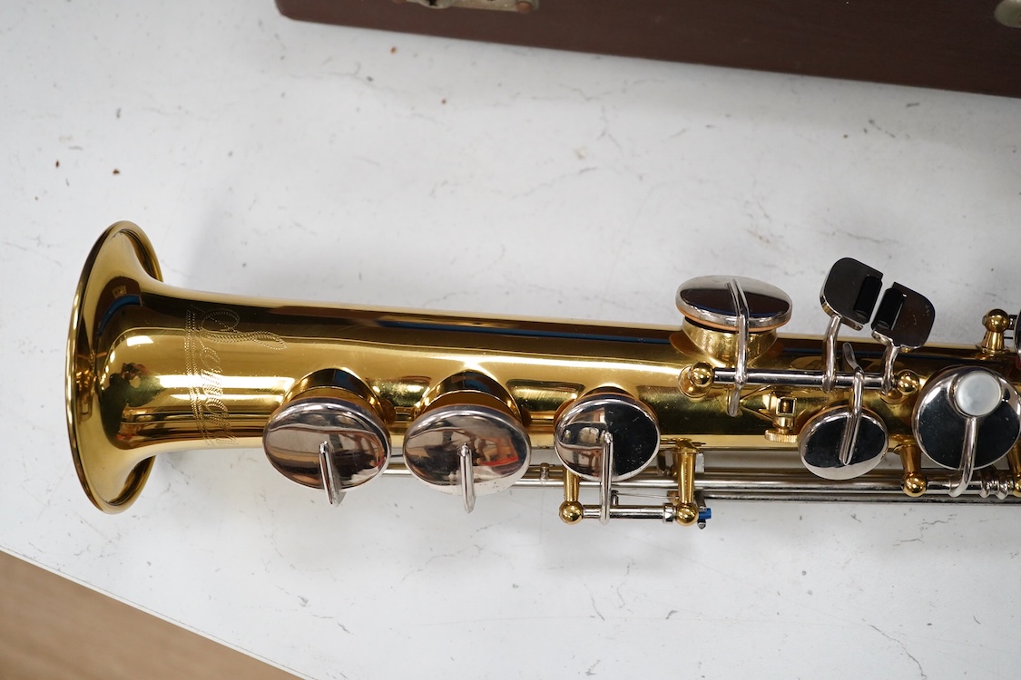 A cased Sonora soprano saxophone in a Rudall Carte branded case